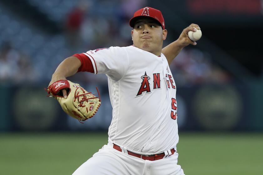 Los Angeles Angels starting pitcher Jose Suarez throws to a Pittsburgh Pirates batter during the first inning of a baseball game in Anaheim, Calif., Monday, Aug. 12, 2019. (AP Photo/Alex Gallardo)
