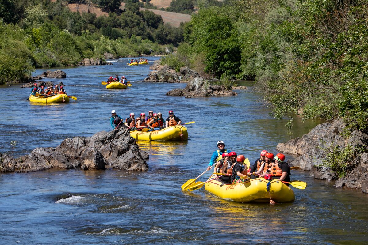 Rafts float down the South Fork of the American River.