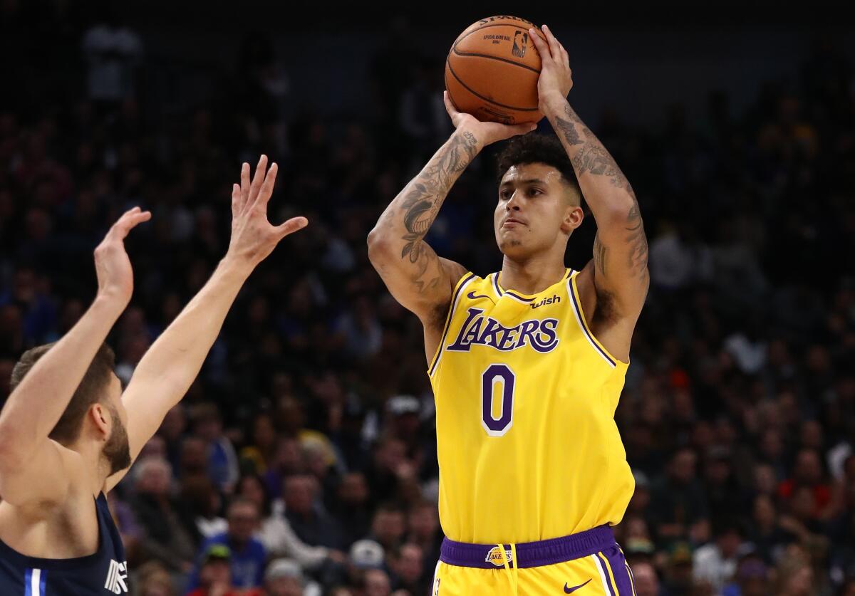 Lakes forward Kyle Kuzma elevates for a shot against the Mavericks on Nov. 1, 2019, in Dallas.