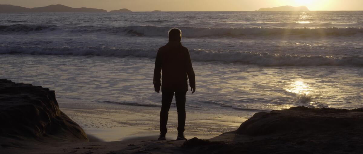 A man looks out toward the ocean in a scene from "Maija Awi," screening at the San Diego Latino Film Festival.