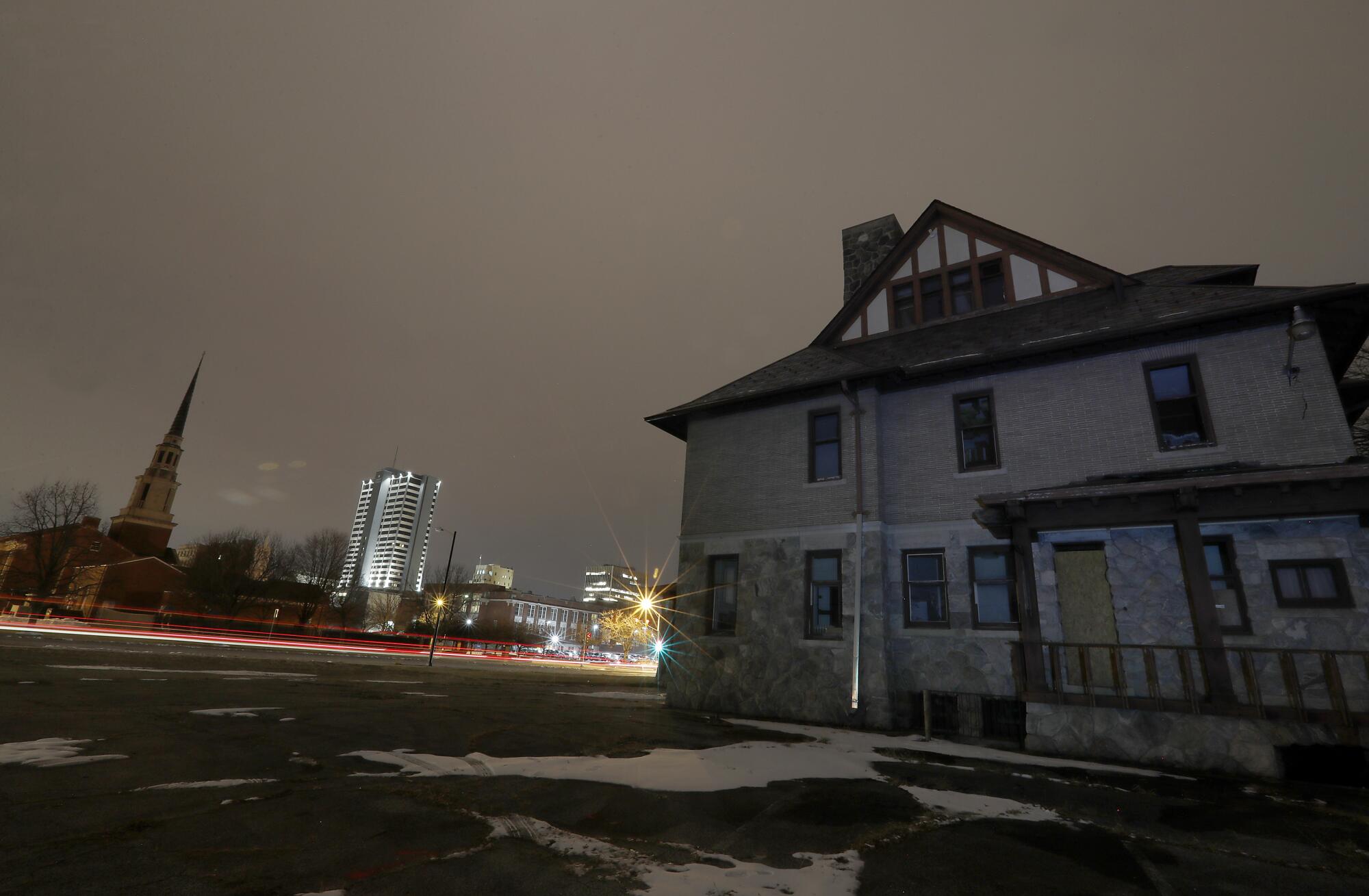 A vacant home next to a vacant lot west of downtown South Bend, Ind.