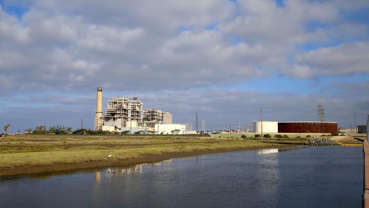 The proposed Poseidon desalination facility would be built near this AES Huntington Beach power plant.