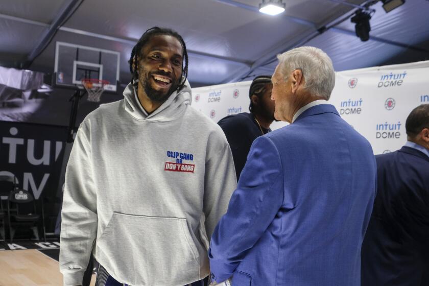 Los Angeles Clippers star Kawhi Leonard and Jerry West attend a groundbreaking ceremony of the Intuit Dome, Friday, Sept. 17, 2021, in Inglewood, Calif. The Clippers' long-awaited, $1.8 billion, the privately funded arena is officially named Intuit Dome. The practice facility, team offices for both business and basketball operations, retail space, and more will all be on the site when it opens in 2024. (AP Photo/Ringo H.W. Chiu)