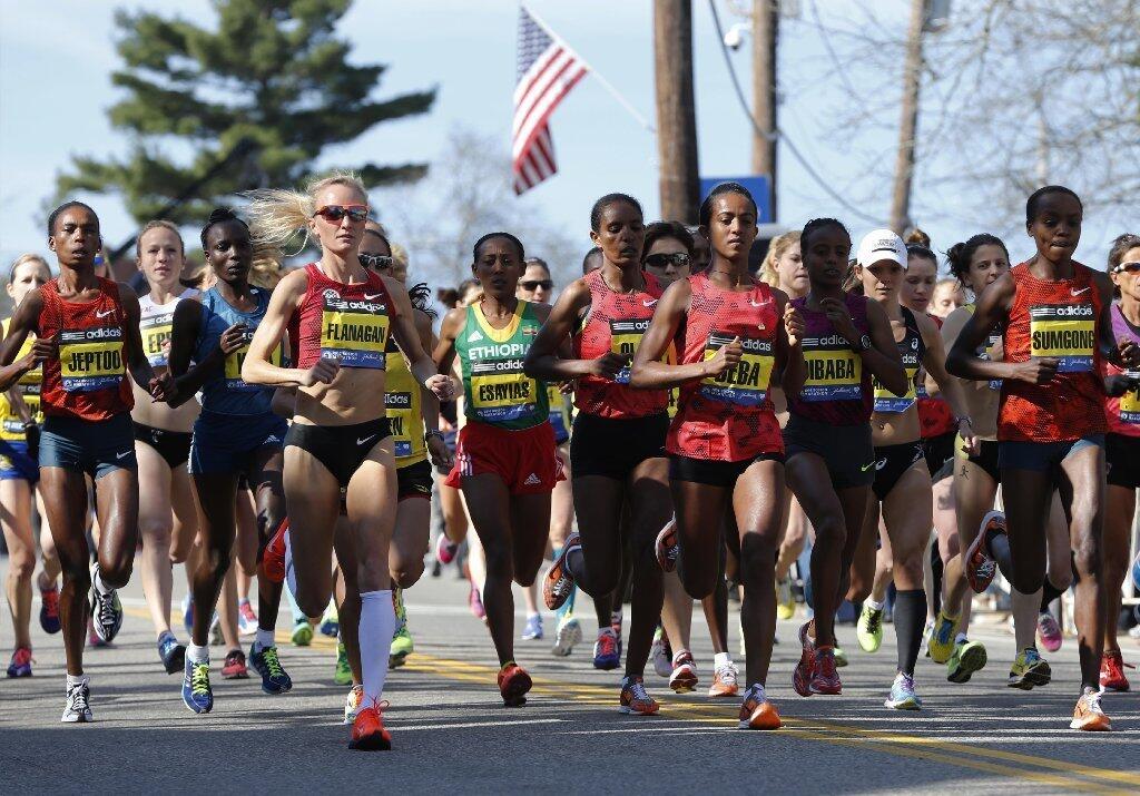 Elite women runners start the marathon
