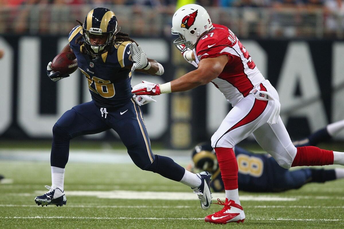 Arizona Cardinals linebacker Lorenzo Alexander, right, chases St. Louis Rams running back Daryl Richardson during a game earlier this month. Alexander suffered a season-ending foot injury in Sunday's loss to the New Orleans Saints.