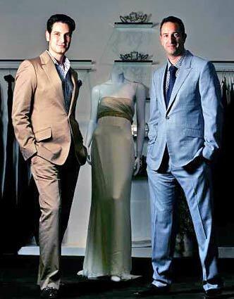 Cameron Silver, left, and Christos Garkinos at their designer resale store in Los Angeles.