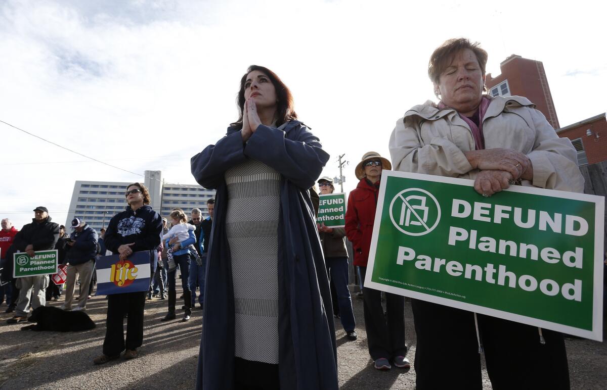 Participants in an anti-abortion rally gather in front of Planned Parenthood of the Rocky Mountains in Denver on Saturday.