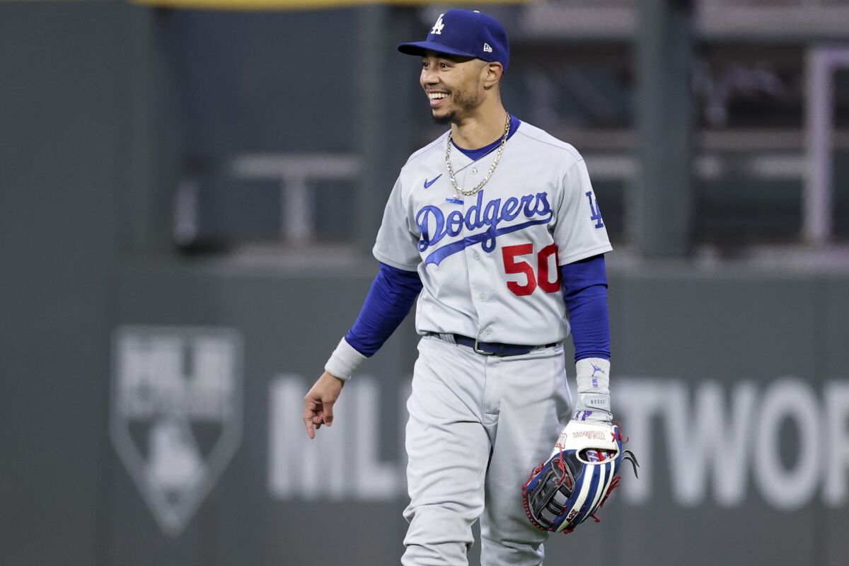 Dodgers right fielder Mookie Betts reacts after making a play on a pop fly in the fourth inning.