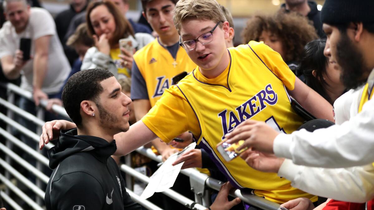 Lakers guard Lonzo Ball talks to some fans in Chicago before a game against the Bulls last week.