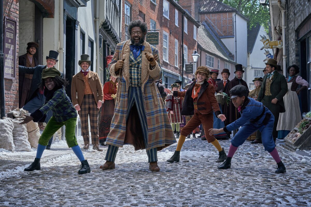 Forest Whitaker and dancing townsfolk in "Jingle Jangle: A Christmas Journey."