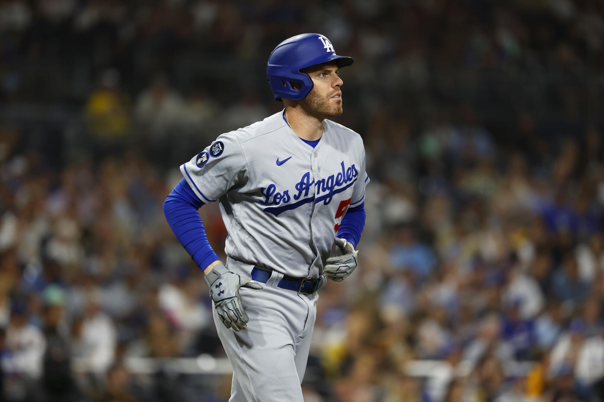 Dodgers' Freddie Freeman walks in the fourth inning against the San Diego Padres.