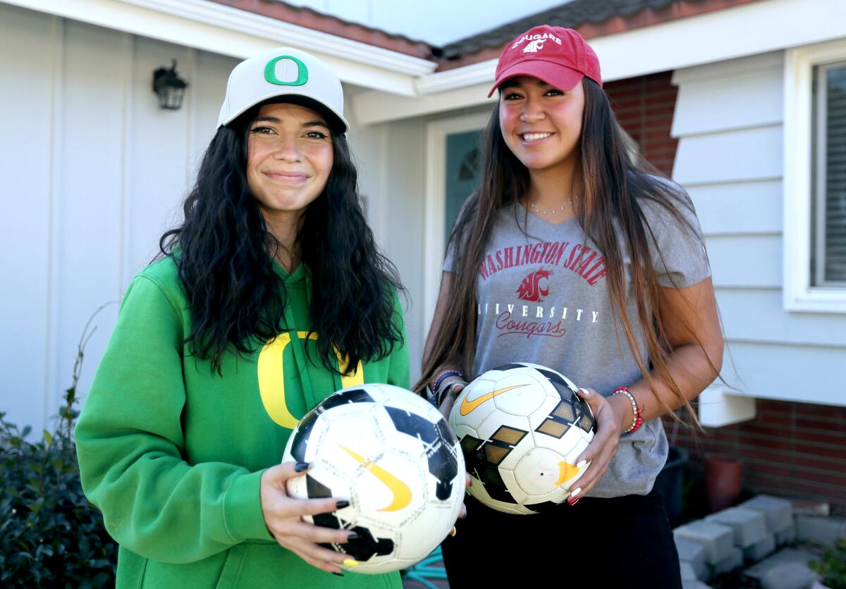 Marina  soccer teammates Kaitlyn Paculba, left, and McKenna Pua committed to Oregon and Washington State, respectively.
