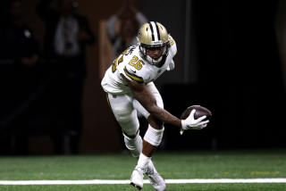 NEW ORLEANS, LOUISIANA - OCTOBER 31: P.J. Williams #26 of the New Orleans Saints intercepts a pass.