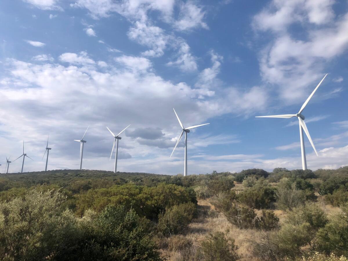 A row of wind turbines near Interstate 8 in Boulevard.