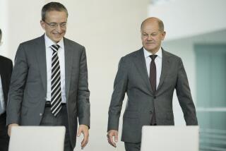 German Chancellor Olaf Scholz, right, and Intel CEO Pat Gelsinger attend the signing ceremony of an agreement between the German government and the company at the Chancellery in Berlin, Germany, Monday, June 19, 2023. (AP Photo/Markus Schreiber)
