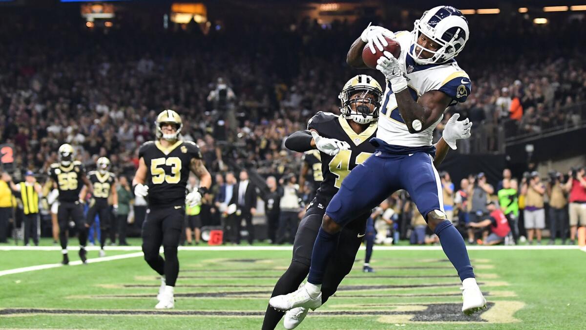 Rams receiver Brandin Cooks catches a touchdown in front of Saints safety Marcus Williams in the second quarter at the Mercedes Benz Superdome on Nov. 4, 2018.