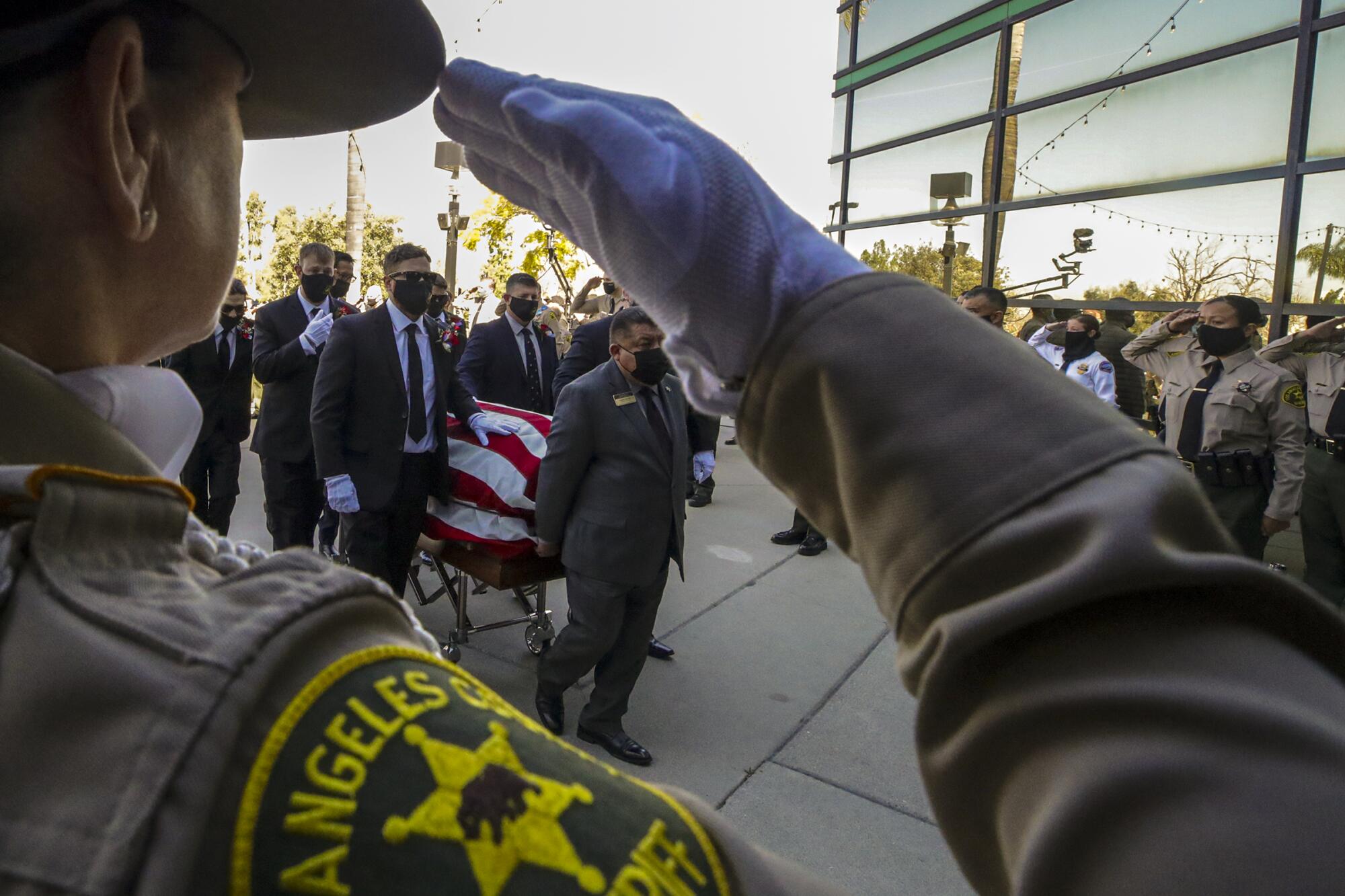 Pallbearers carrying casket of Deputy Thomas Albanese of the Los Angeles County Sheriff's Department