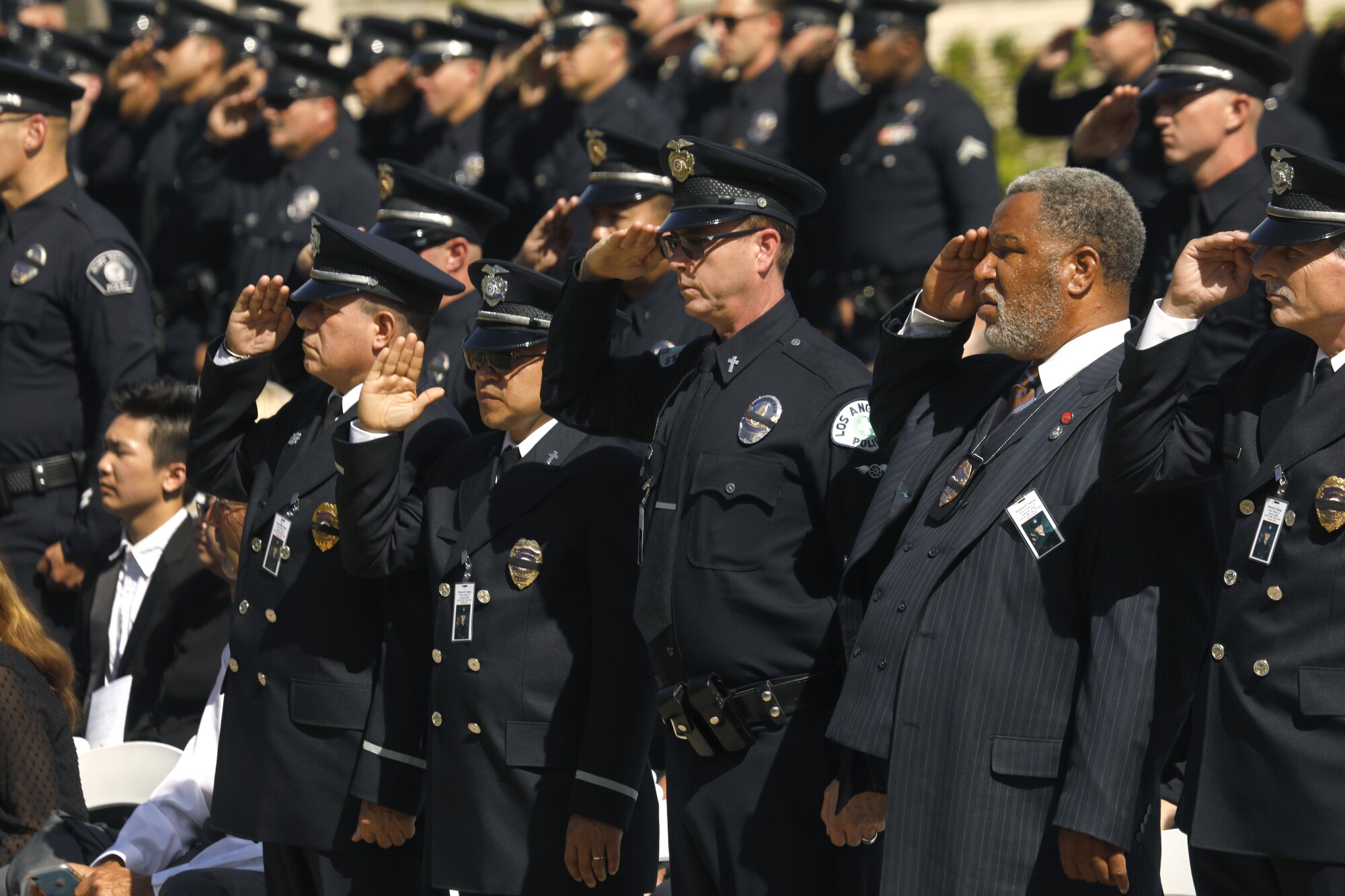 Family, friends, city officials and fellow officers honor Officer Tipping.