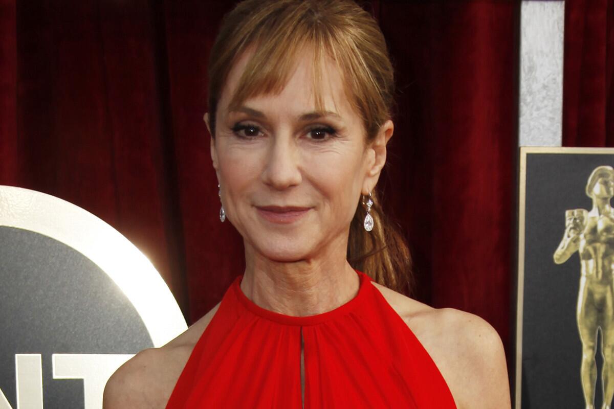 Holly Hunter arrives for the 20th Annual Screen Actors Guild Awards at the Shrine Exposition Center in Los Angeles on Saturday.