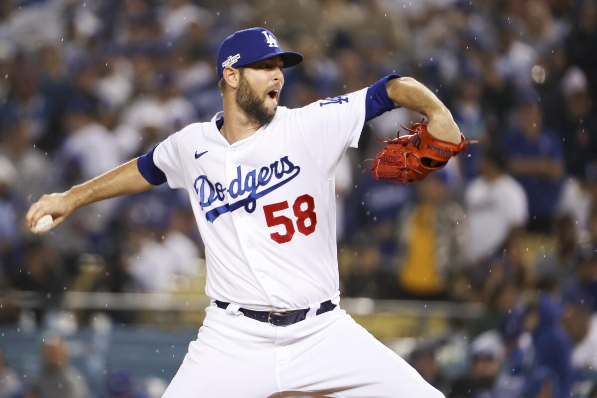 Dodgers pitcher Chris Martin delivers a pitch during the ninth inning of Game 1 of the NLDS against the San Diego Padres.
