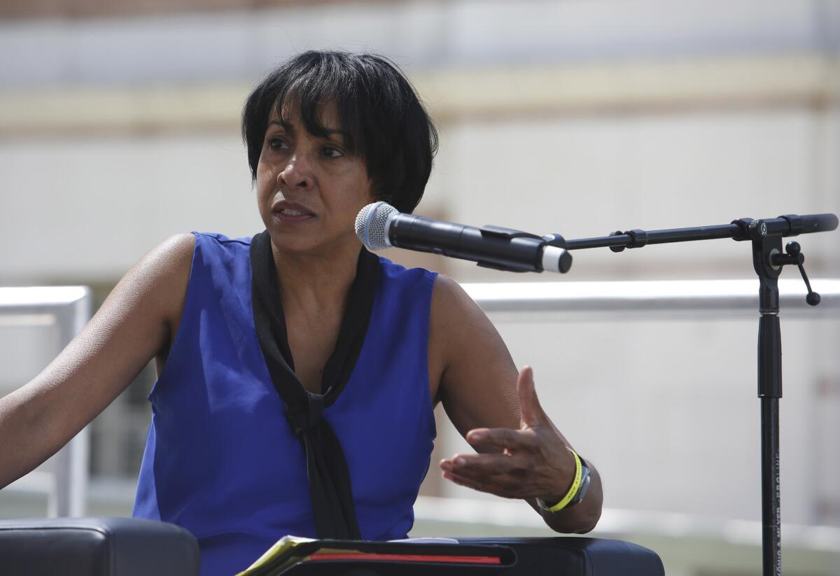 Sandy Banks poses a question to author Maria Bello at the 2015 L.A. Times Festival of Books.