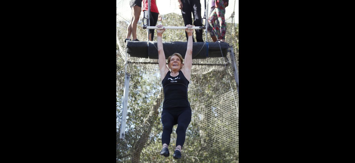 Betty Goedhart, 85, swings on a trapeze at Trapeze High in Escondido.