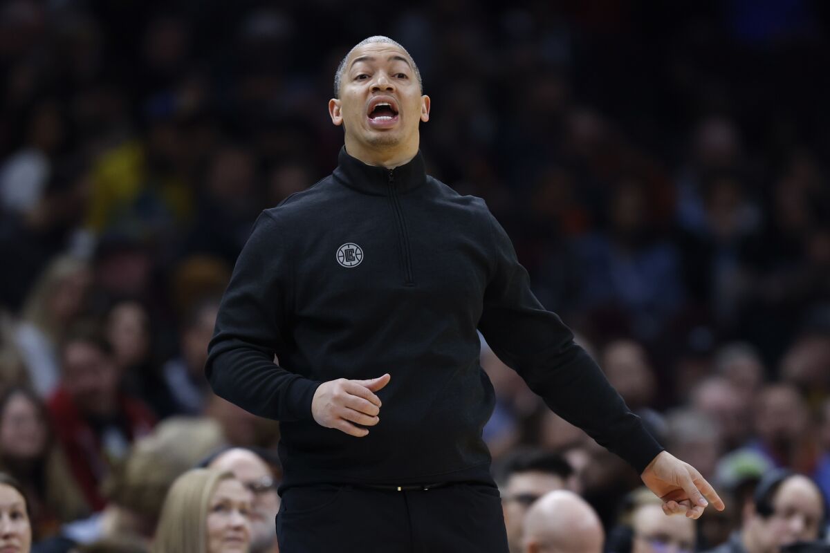 Clippers coach Tyronn Lue directs his players during Sunday's loss to the Cavaliers.