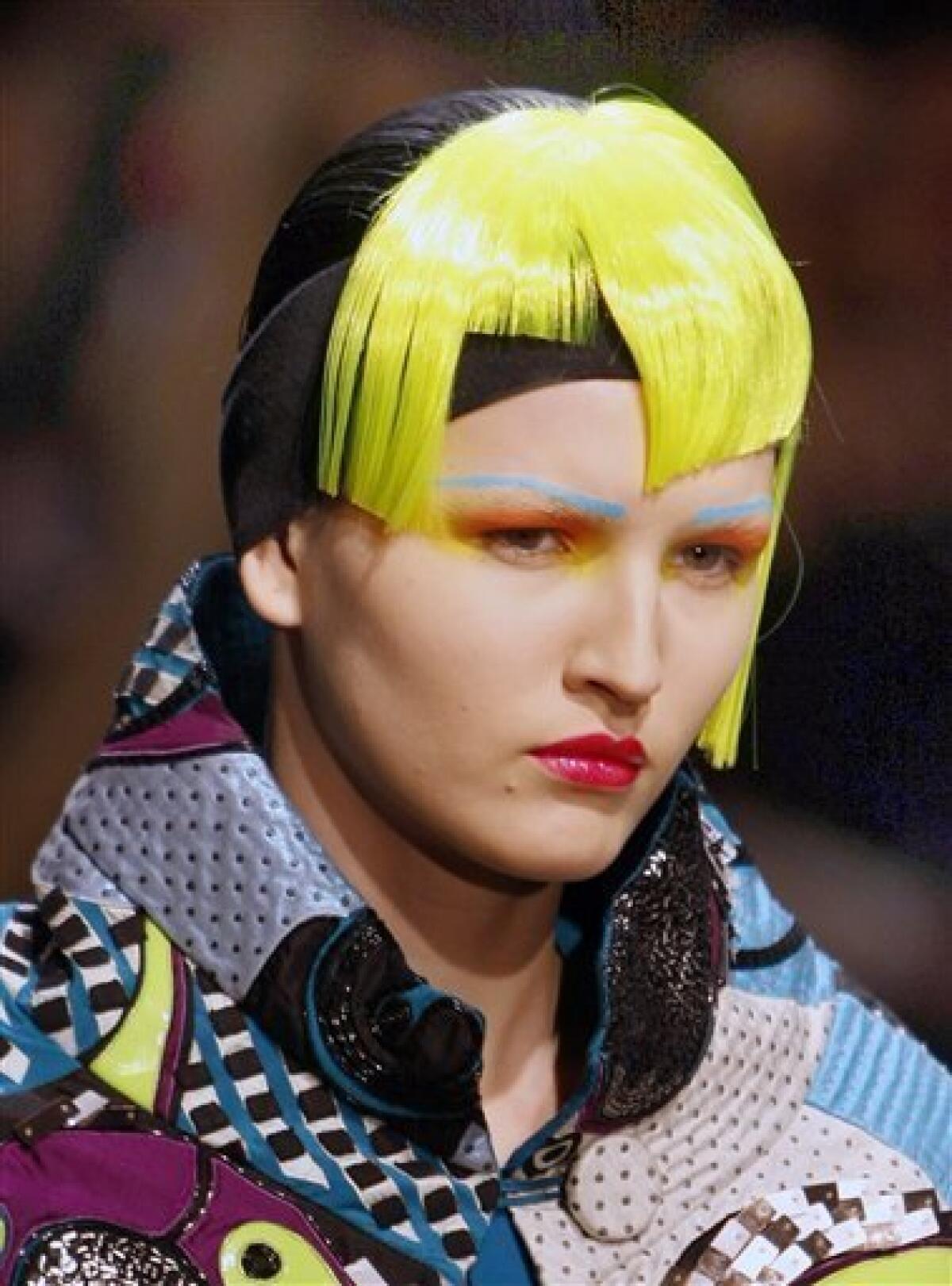A model wears a creation by Indian fashion designer Manish Arora as part of his Fall-Winter 2010-2011 ready-to-wear collection presented in Paris, Thursday March 4, 2010. (AP Photo/Remy de la Mauviniere)