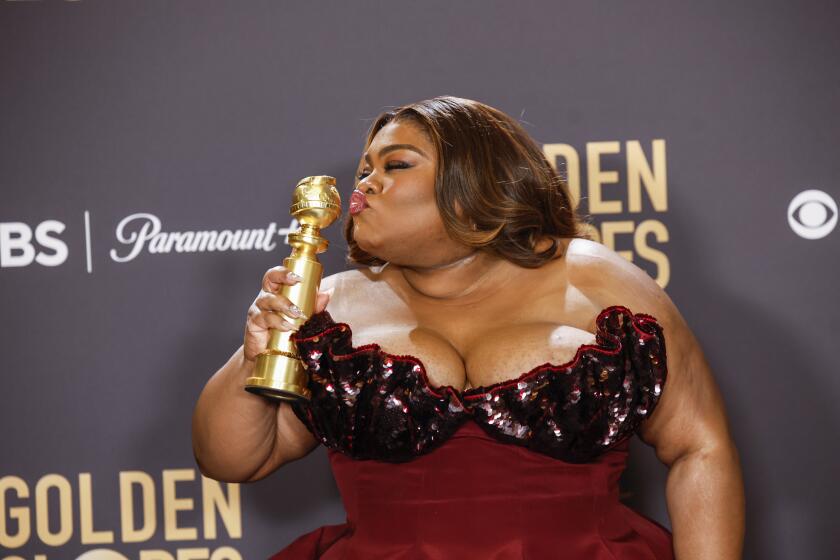 BEVERLY HILLS, CALIFORNIA - JANUARY 7: 81st GOLDEN GLOBE AWARDS -- US actress Da'Vine Joy Randolph poses with the award for Best Performance by a Female Actor in a Supporting Role in any Motion Picture for "The Holdovers" in the press room at the 81st Annual Golden Globe Awards held at the Beverly Hilton Hotel on January 7, 2024. (Photo by Jason Armond / Los Angeles Times)