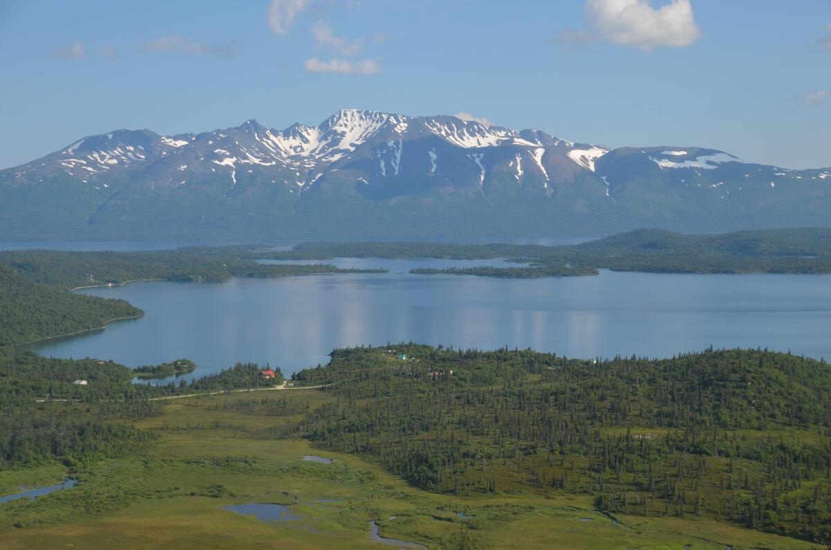 Mountains rise above pristine Iliamna Lake and Pedro Bay.