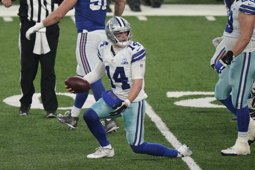 Dallas Cowboys quarterback Andy Dalton reacts after being sacked during the second half of an NFL football game against the New York Giants, Sunday, Jan. 3, 2021, in East Rutherford, N.J. (AP Photo/Corey Sipkin)