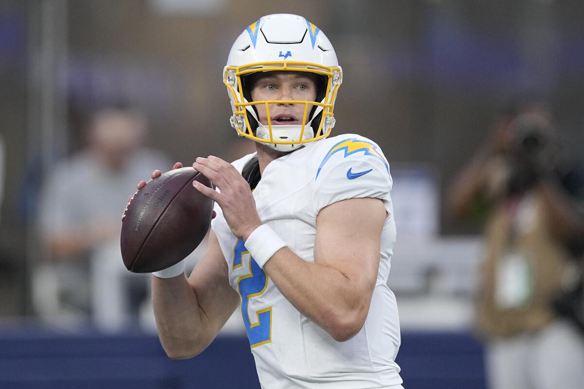 Chargers quarterback Easton Stick looks to pass in the first half against the Rams.