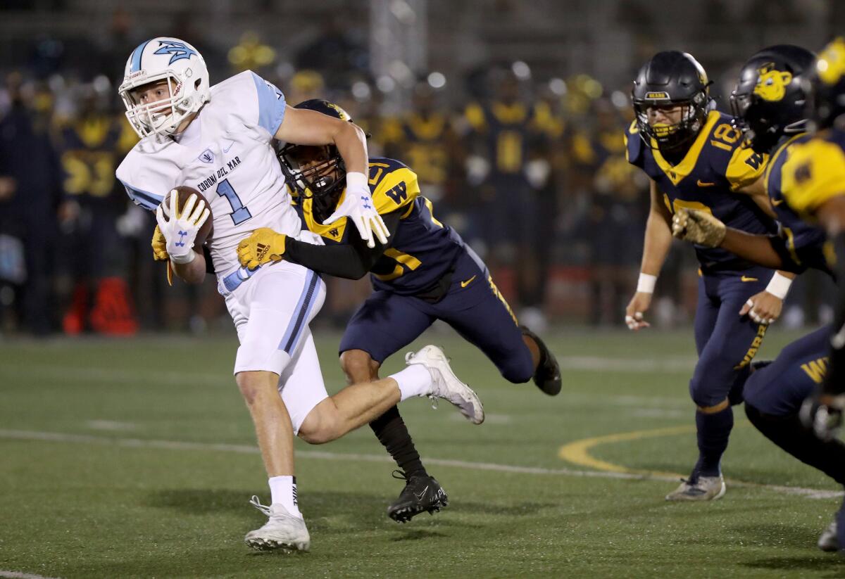 Corona del Mar's Max Lane gets caught from behind.