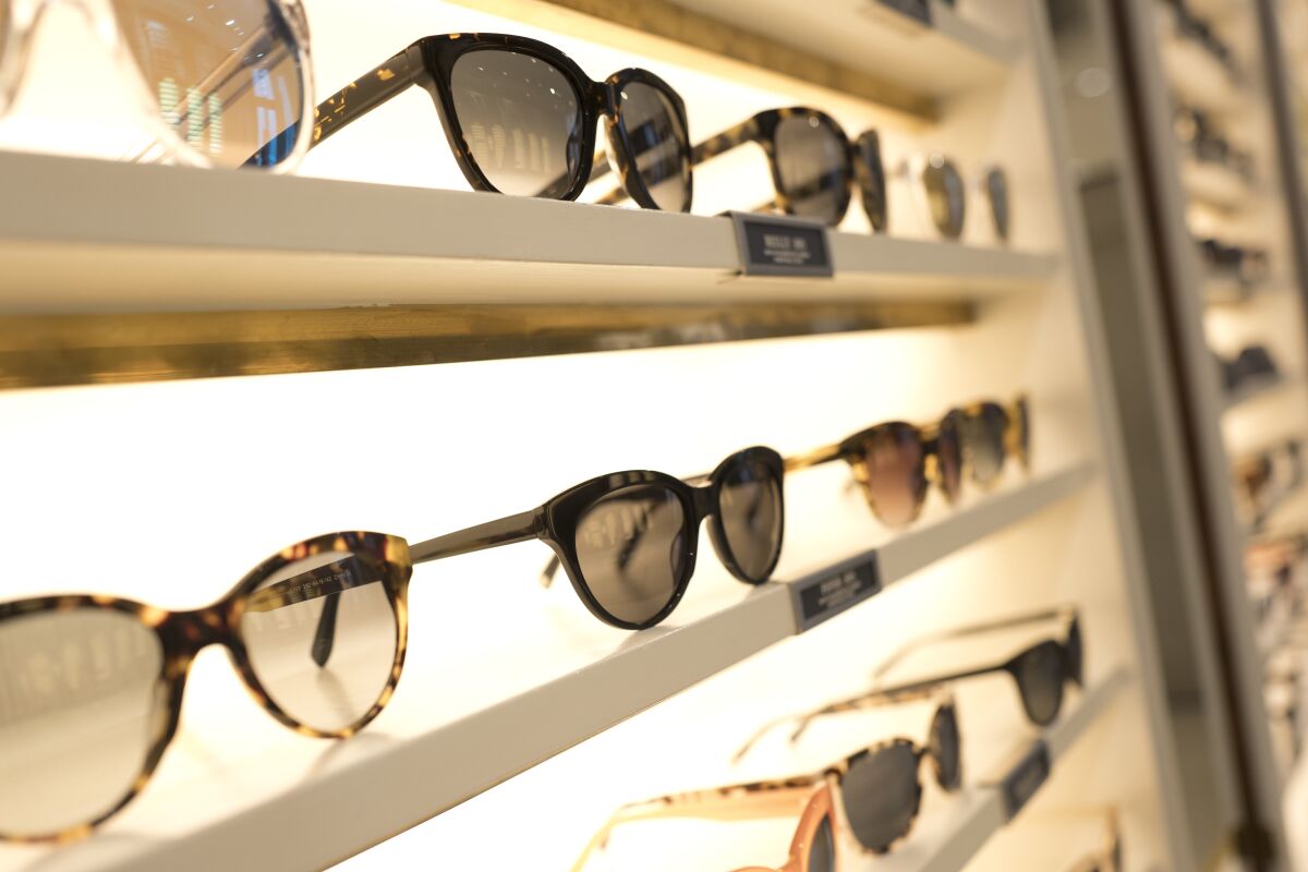 Warby Parker eyewear is displayed at a company retail store in 2017.