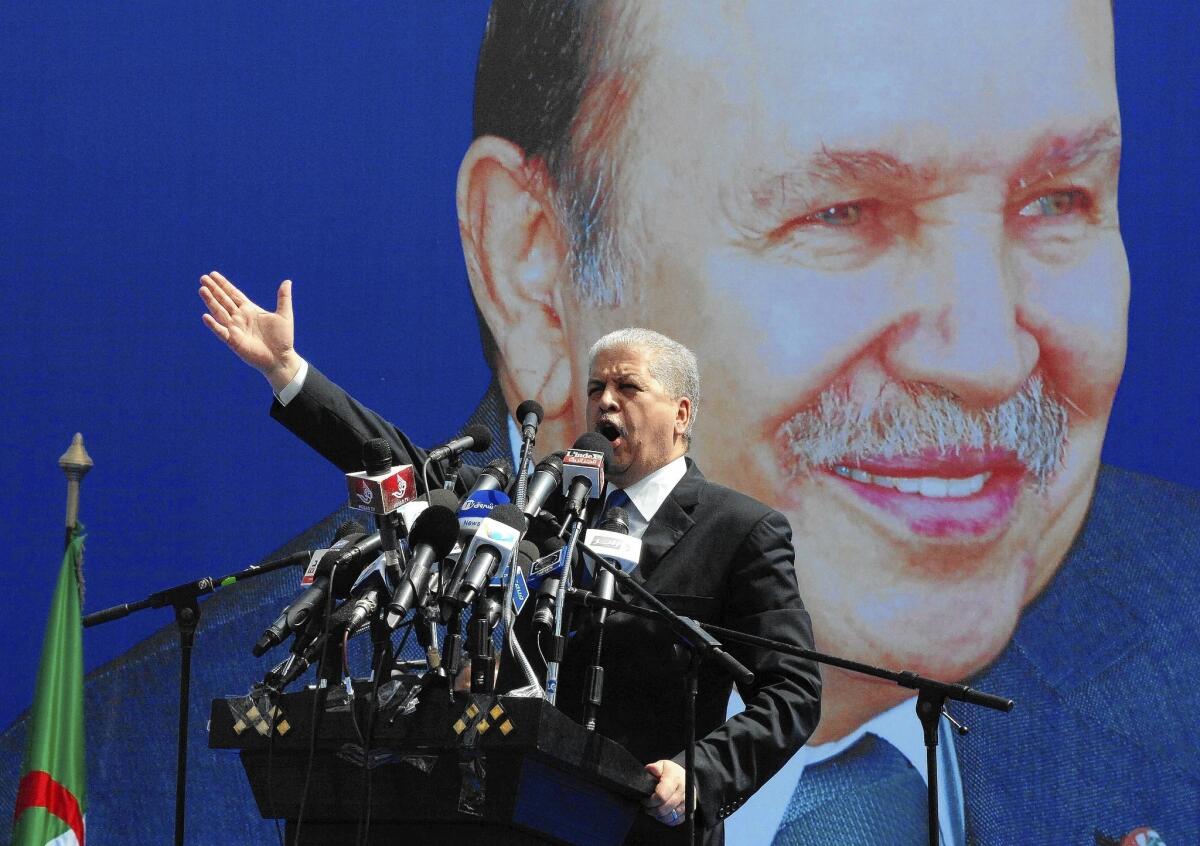 The campaign manager for Algerian President Abdelaziz Bouteflika delivers a speech to supporters last week.