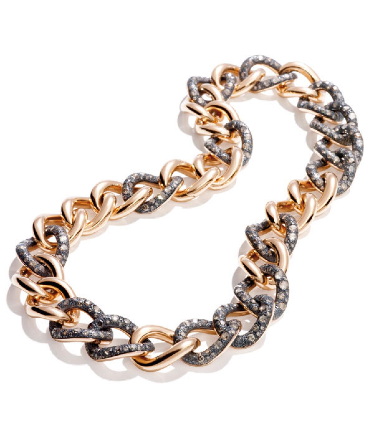 Pomellato 18-karat rose gold and diamond pave Tango necklace.