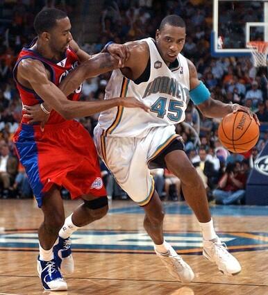 New Orleans Hornets forward Rasual Butler breaks around Los Angeles Clippers' Quinton Ross.