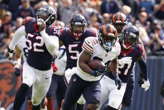 Chicago Bears running back Khalil Herbert (24) runs with the ball during the second half of an NFL football game against the Houston Texans, Sunday, Sept. 25, 2021, in Chicago. The Bears won 23-20. (AP Photo/Nam Y. Huh)