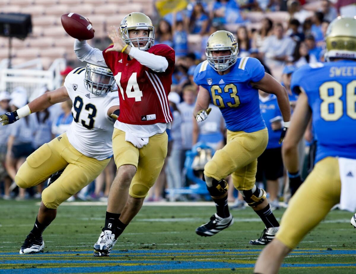 UCLA quarterback T.J. Millweard (14), shown at spring game in April, was battling for the Bruins' backup quarterback spot.