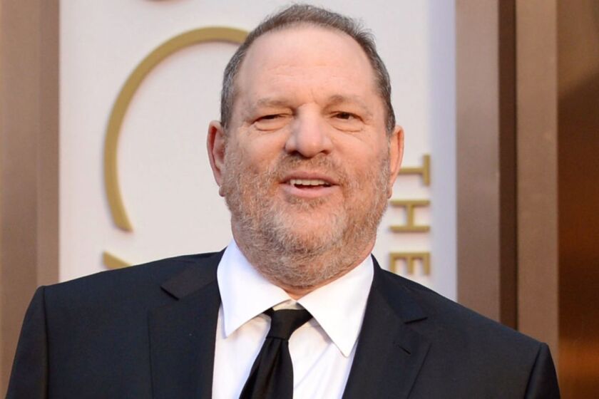 FILE - In this March 2, 2014 file photo, Harvey Weinstein arrives at the Oscars in Los Angeles. Day by day, the accusations pile up, as scores of women come forward to say they were victims of Weinstein. But others with stories to tell have not. For some of these women whoâve chosen not to go public, the fear of being associated forever with the sordid scandal _ and the effects on their careers, and their lives _ might be too great. Or they may still be struggling with the lingering effects of their encounters. (Photo by Jordan Strauss/Invision/AP, File)