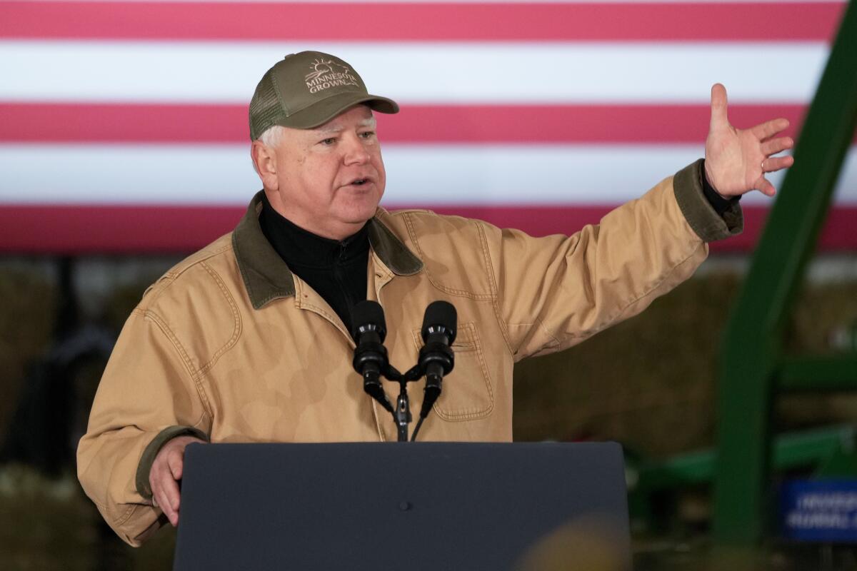 Minnesota Gov. Tim Walz speaks before President Biden at an event in Northfield, Minn., in 2023.