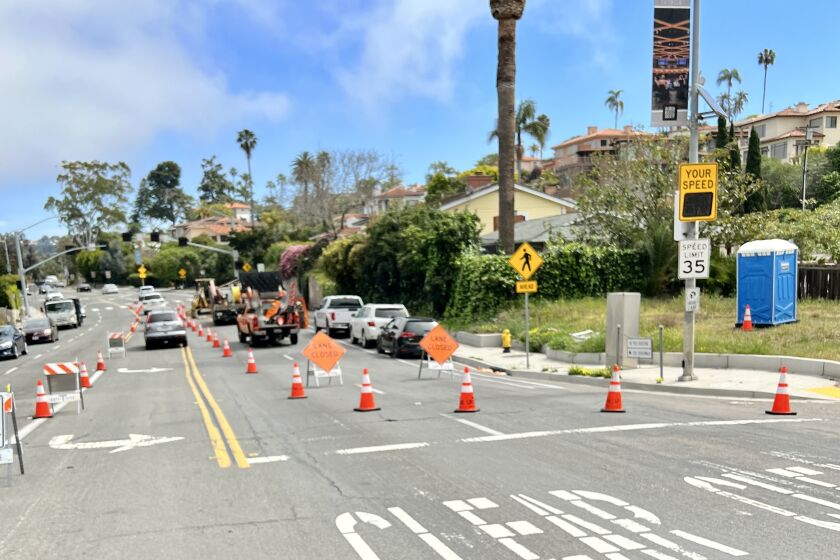 Traffic is impacted by an SDG&E trenching project to replace gas lines on Torrey Pines Road bet. Amalfi and Princess streets.
