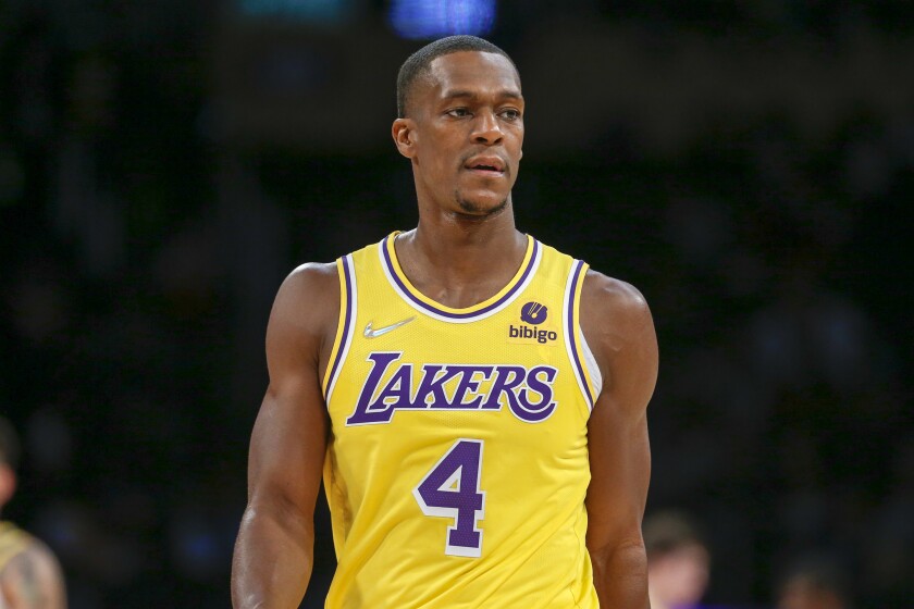 FILE - Los Angeles Lakers guard Rajon Rondo (4) stands during the first half of a preseason NBA basketball game against the Golden State Warriors in Los Angeles, Tuesday, Oct. 12, 2021. Cleveland completed its acquisition of the 35-year-old Rondo on Monday, Jan. 3, 2021, finalizing their trade with the Los Angeles Lakers and what became a three-team deal also involving the New York Knicks.(AP Photo/Ringo H.W. Chiu, File)