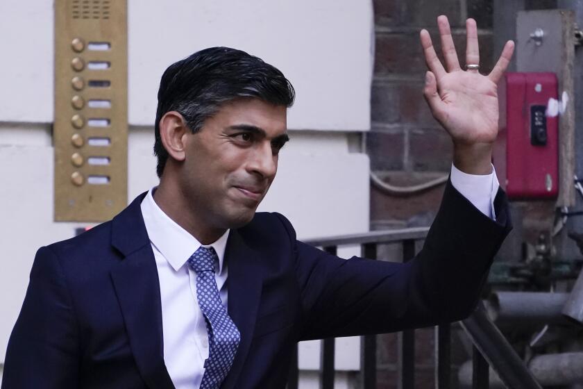 Rishi Sunak leaves the Conservative Campaign Headquarters in London, Monday, Oct. 24, 2022. Rishi Sunak will become the next Prime Minister after winning the Conservative Party leadership contest. (AP Photo/Aberto Pezzali)