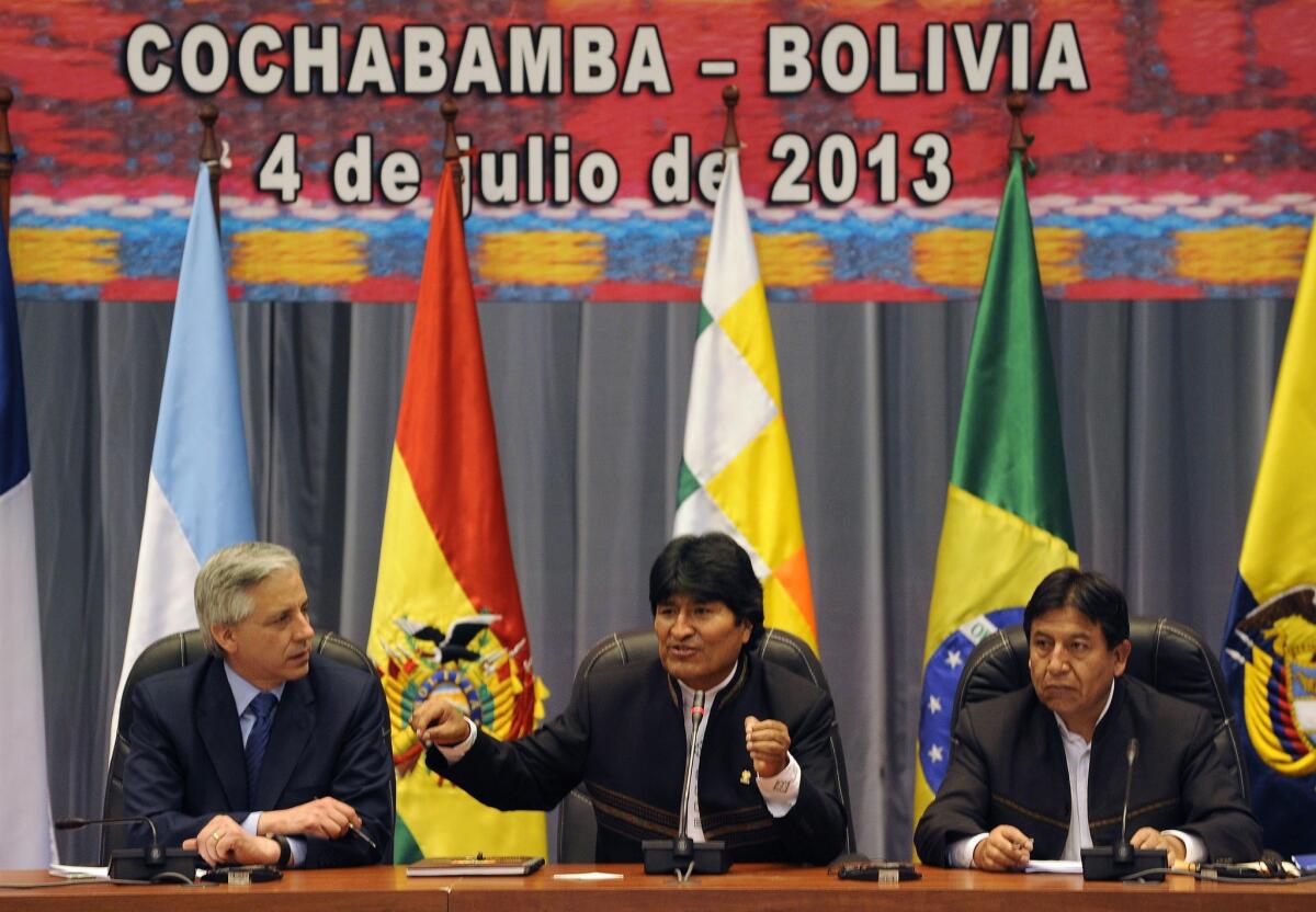 Bolivian President Evo Morales, center, hosts a meeting with other Latin American leftists Thursday in Cochabamba, Bolivia, to accuse Washington of orchestrating a "hostile act." Four European countries denied airspace entry to Morales' plane Tuesday after being informed that NSA leaker Edward Snowden, on the run from U.S. officials, might be on board.