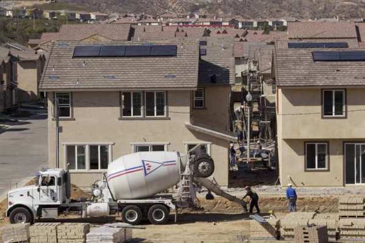 New homes under construction in Santa Clarita last month. U.S. builders started work on fewer homes in March while requesting the most permits for future projects in 3½ years.
