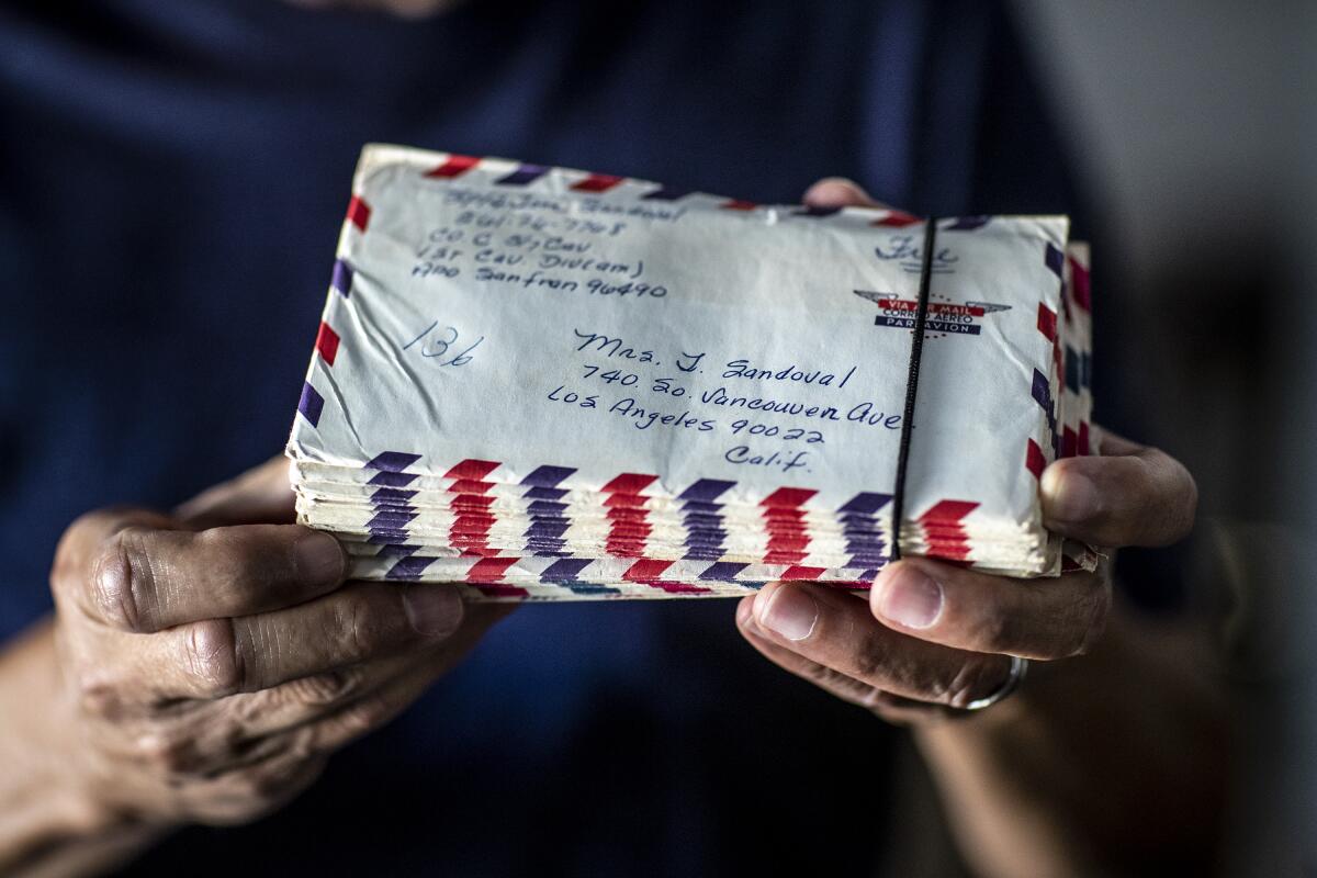 Tom Sandoval keeps a stack of letters he wrote to his wife while serving in Vietnam.