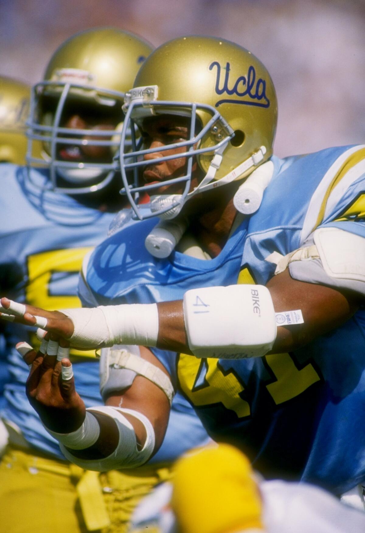 Linebacker Ken Norton Jr. of the UCLA Bruins runs down the field against the Oregon Ducks in Pasadena.