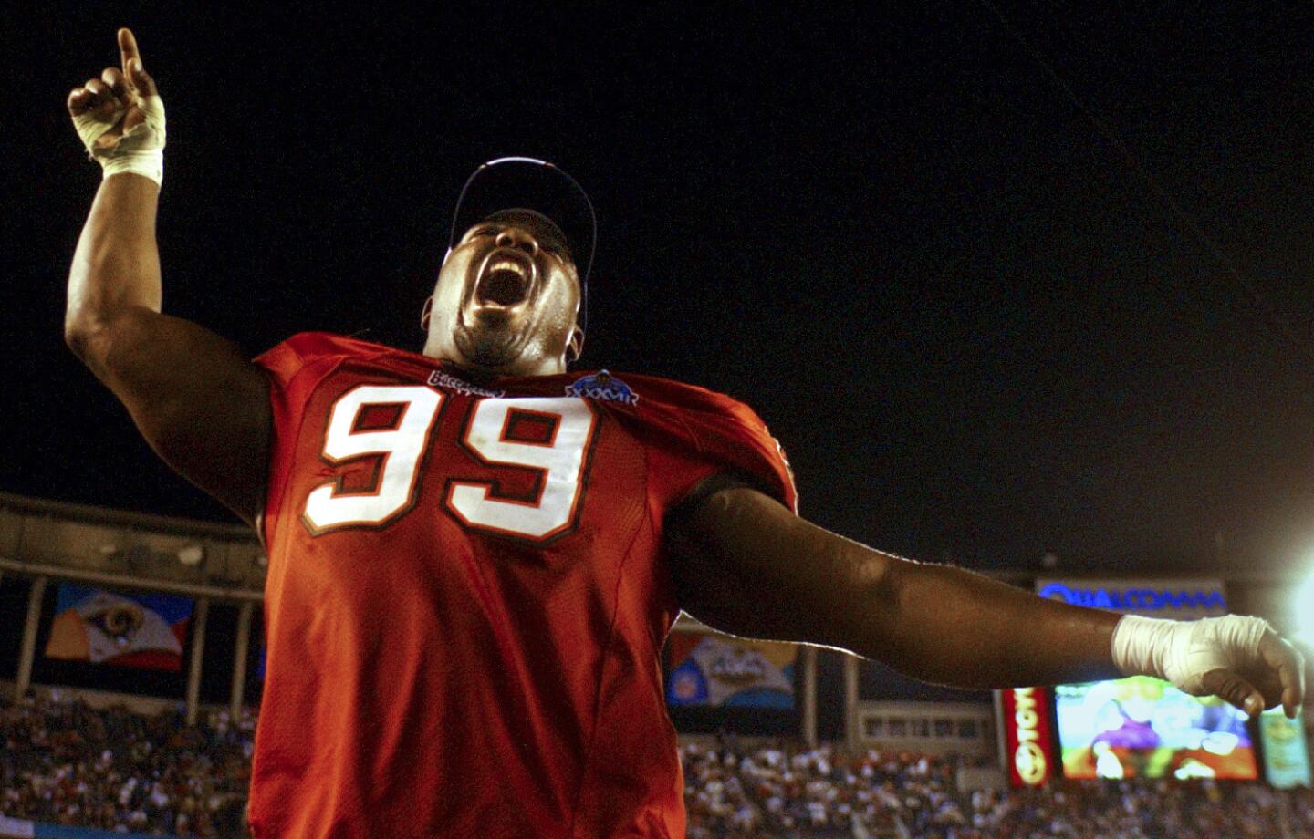 Tampa Bay Buccaneer's Warren Sapp celebrates their victory over the Oakland Raiders in Super Bowl XXXVII in San Diego, Ca. on Sunday, January 26, 2003..