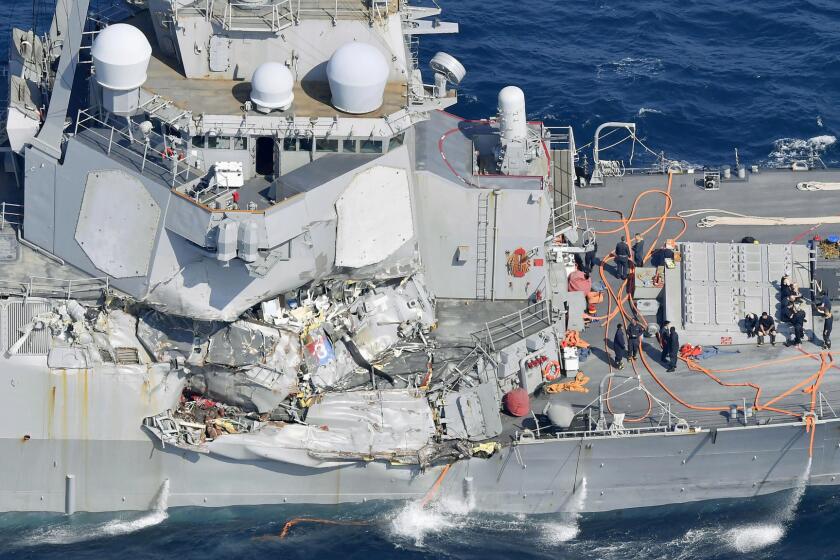 The damage of the right side of the USS Fitzgerald is seen off Shimoda, Shizuoka prefecture, Japan, after the Navy destroyer collided with a merchant ship, Saturday, June 16, 2017. The U.S. Navy says the USS Fitzgerald suffered damage below the water line on its starboard side after it collided with a Philippine-flagged merchant ship. (Iori Sagisawa/Kyodo News via AP)